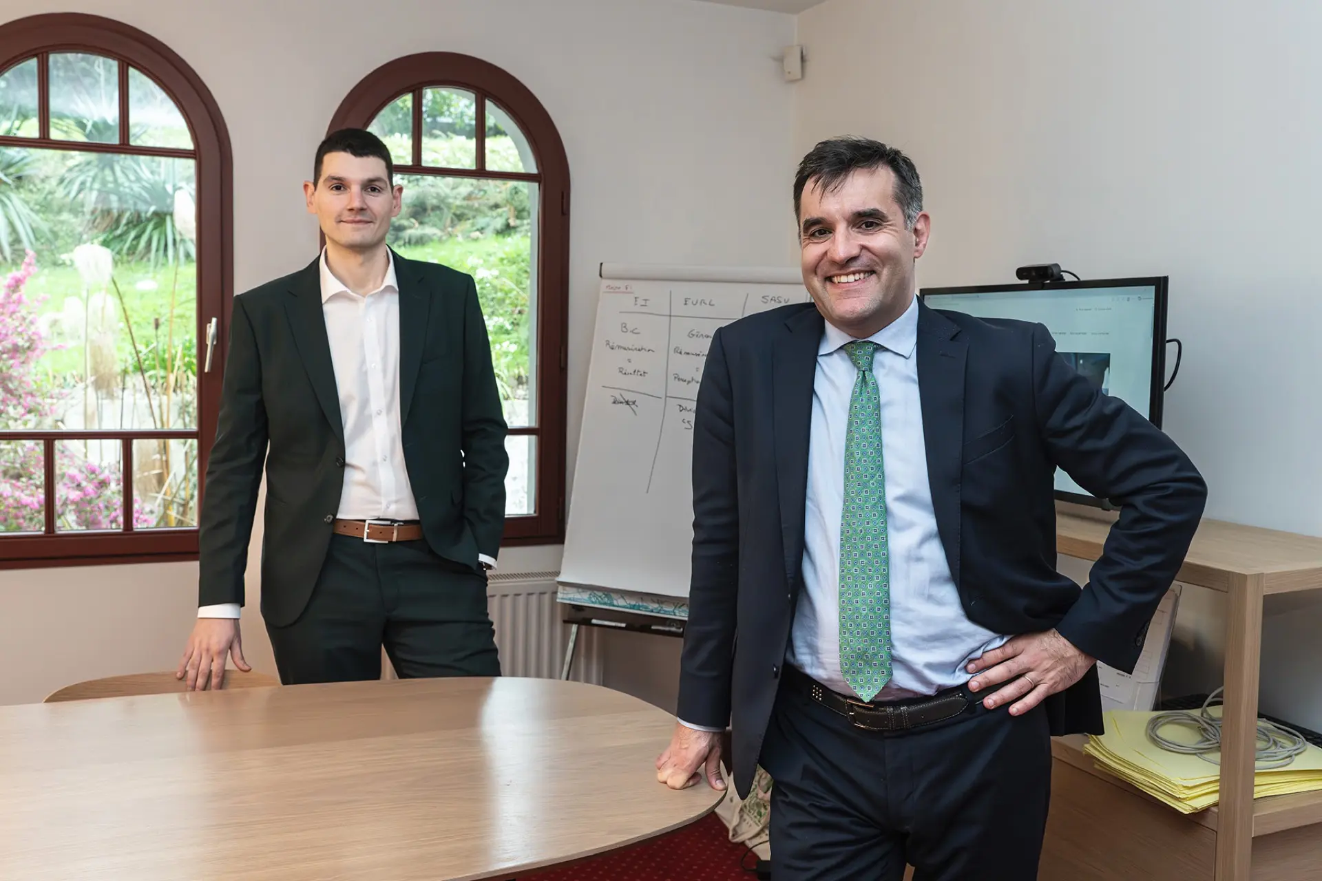 deux associés du cabinet face